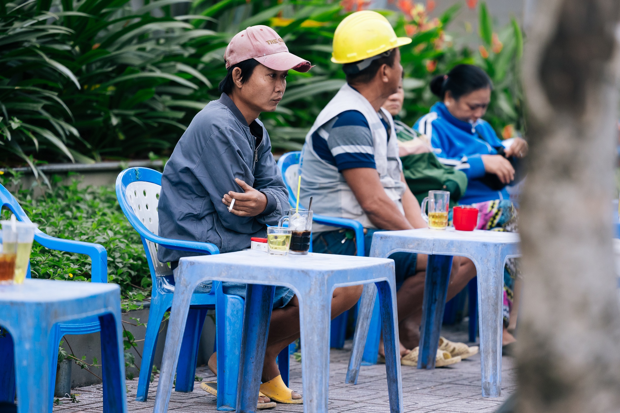 Chùm ảnh: TP.HCM trong ngày rét 19 độ C hiếm thấy- Ảnh 16.